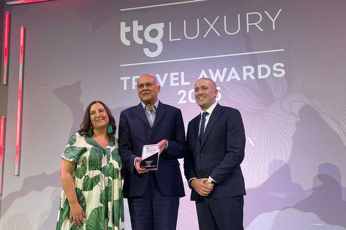 Praveen Moman, founder of Volcanoes Safaris, has been recognized with the prestigious Sustainability Hero of the Year award at the TTG Luxury Travel Awards